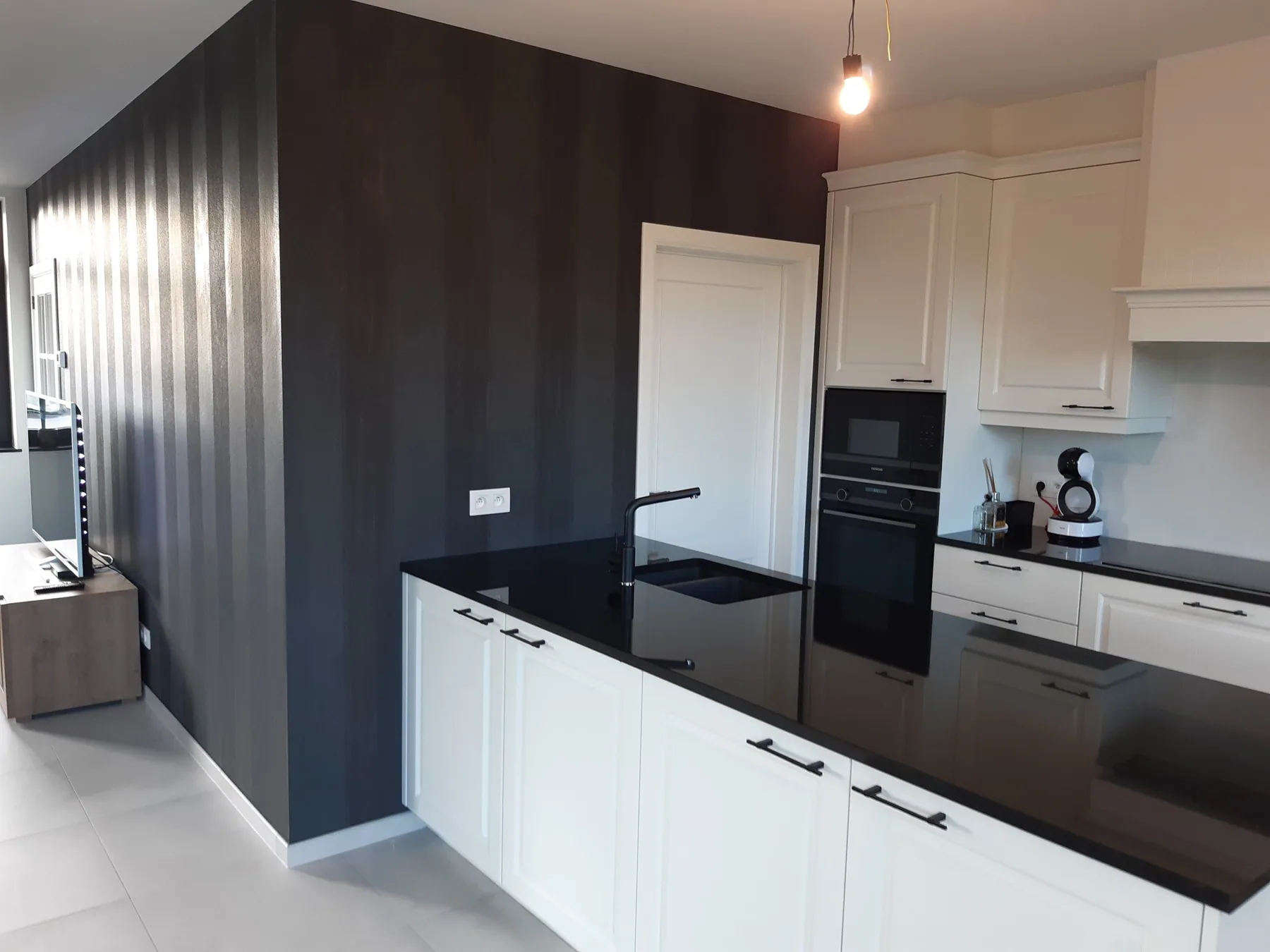 Behangwerken in een woning in Leuven